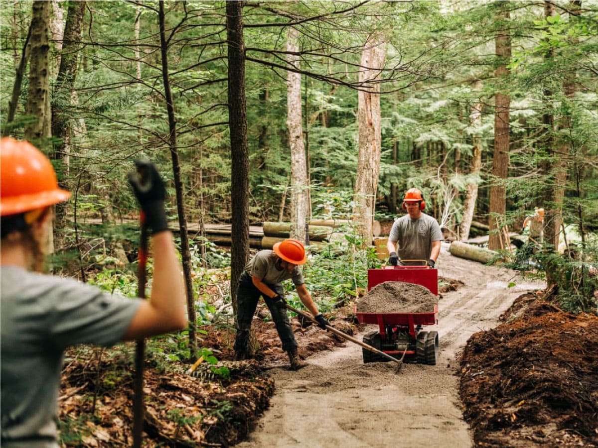 Workers building a gravel path