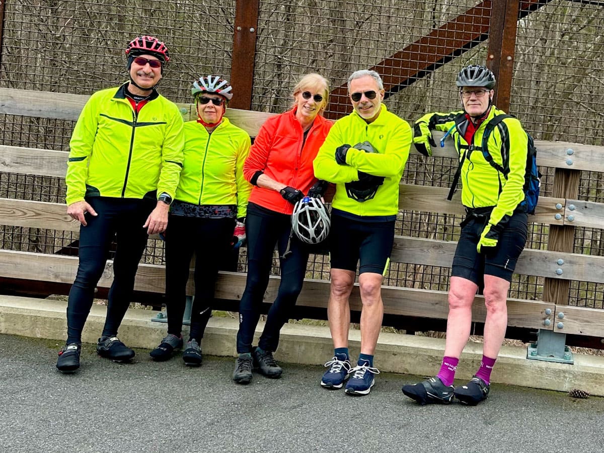Bicyclists pose for a group photo