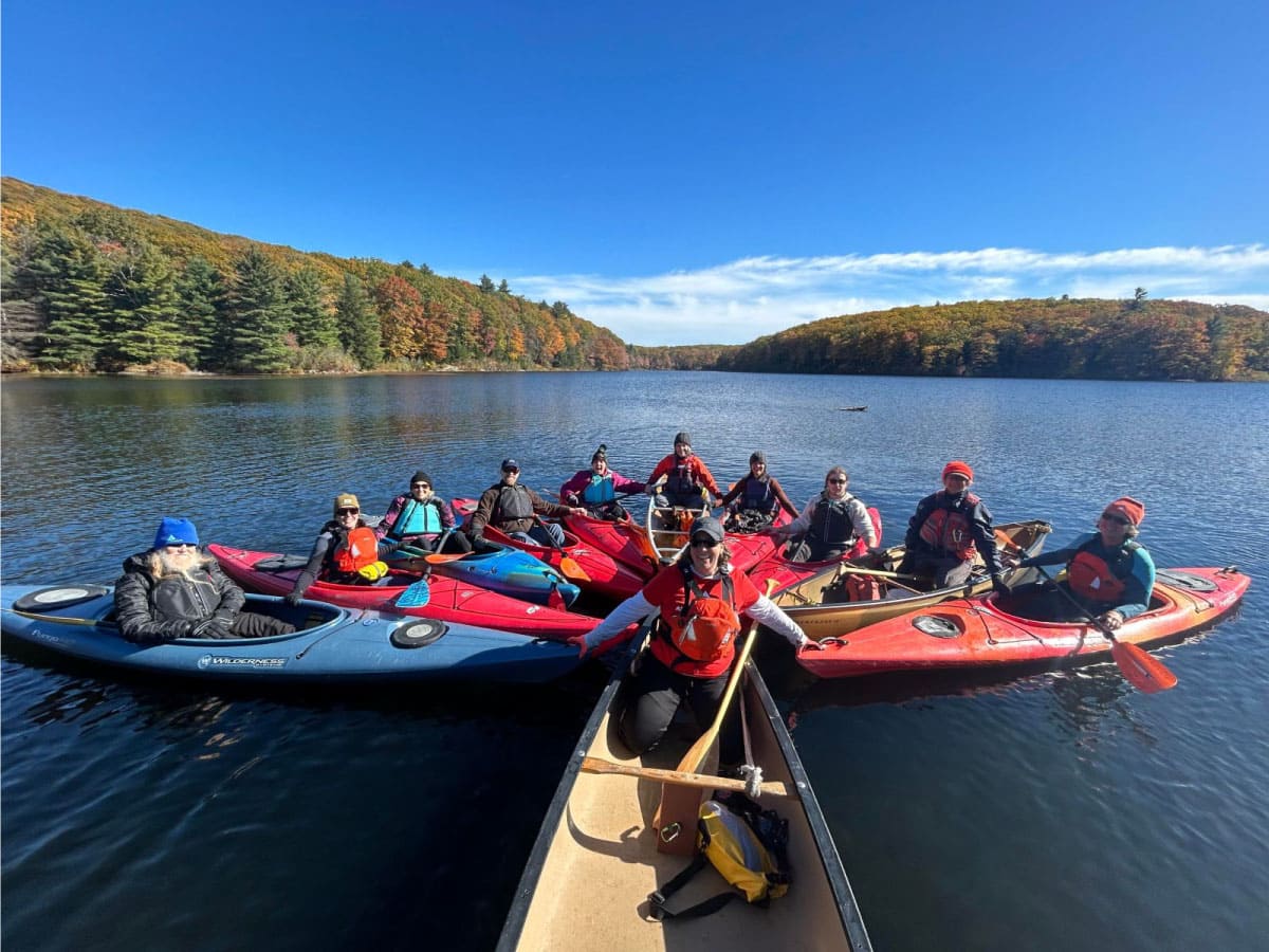 Kayakers put their bows together