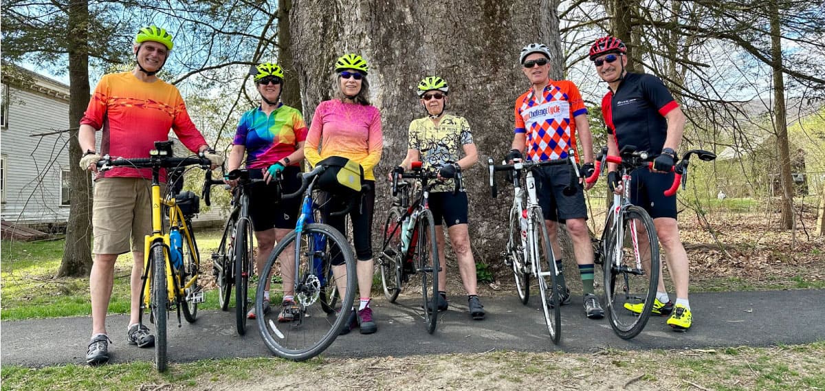 Cyclists pose for a group picture