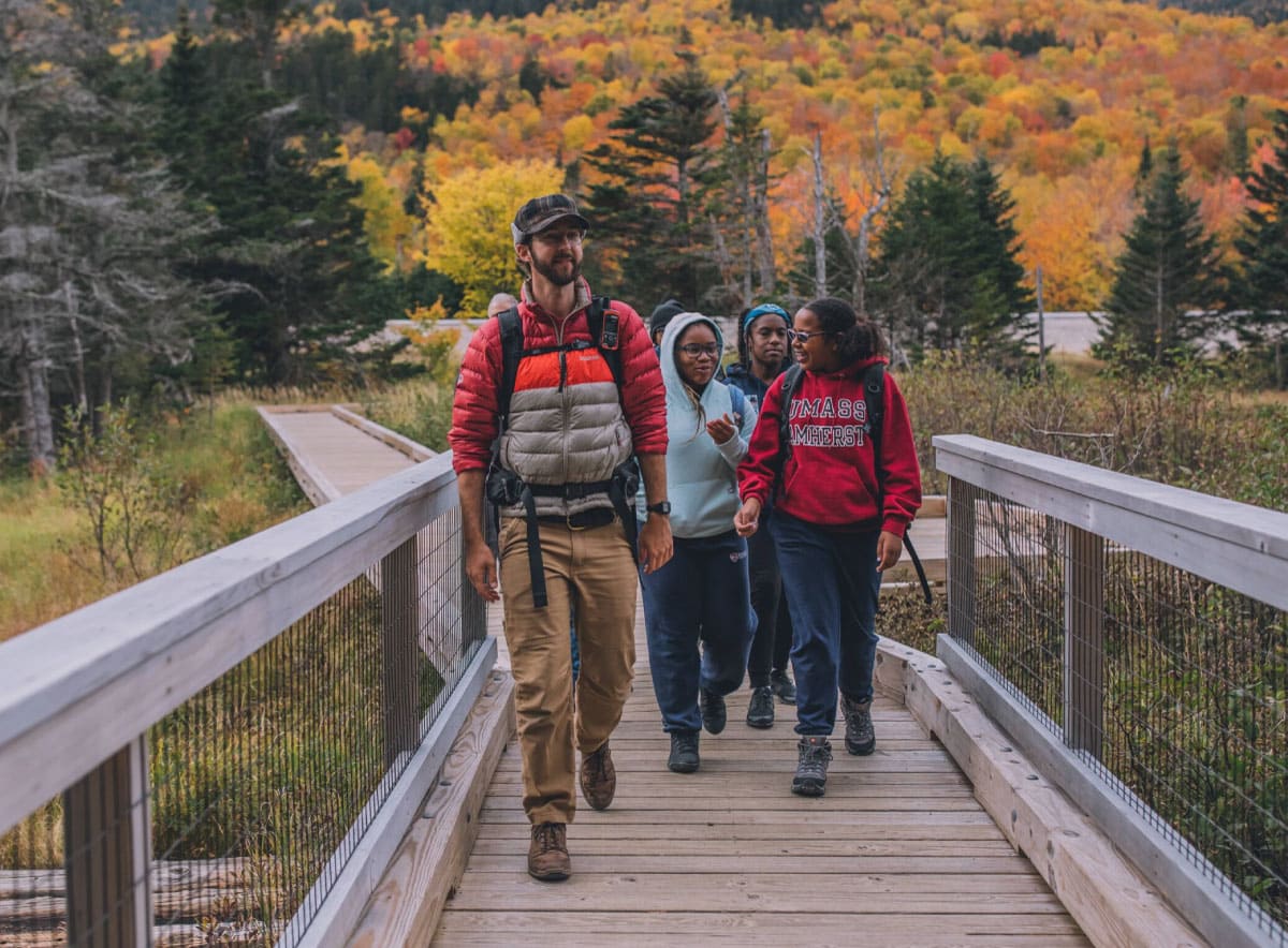 Hikers on a bridge