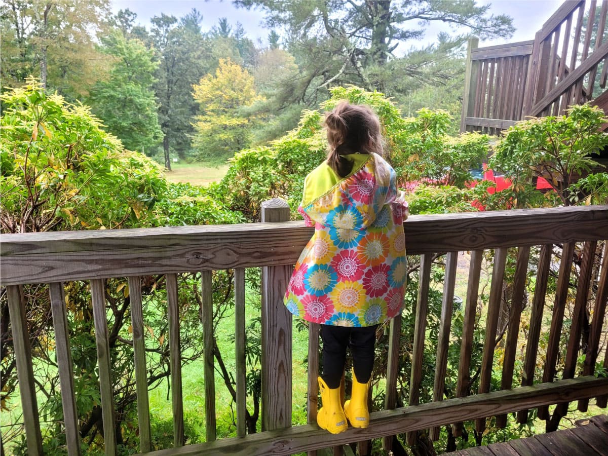 Girl in a colorful raincoat