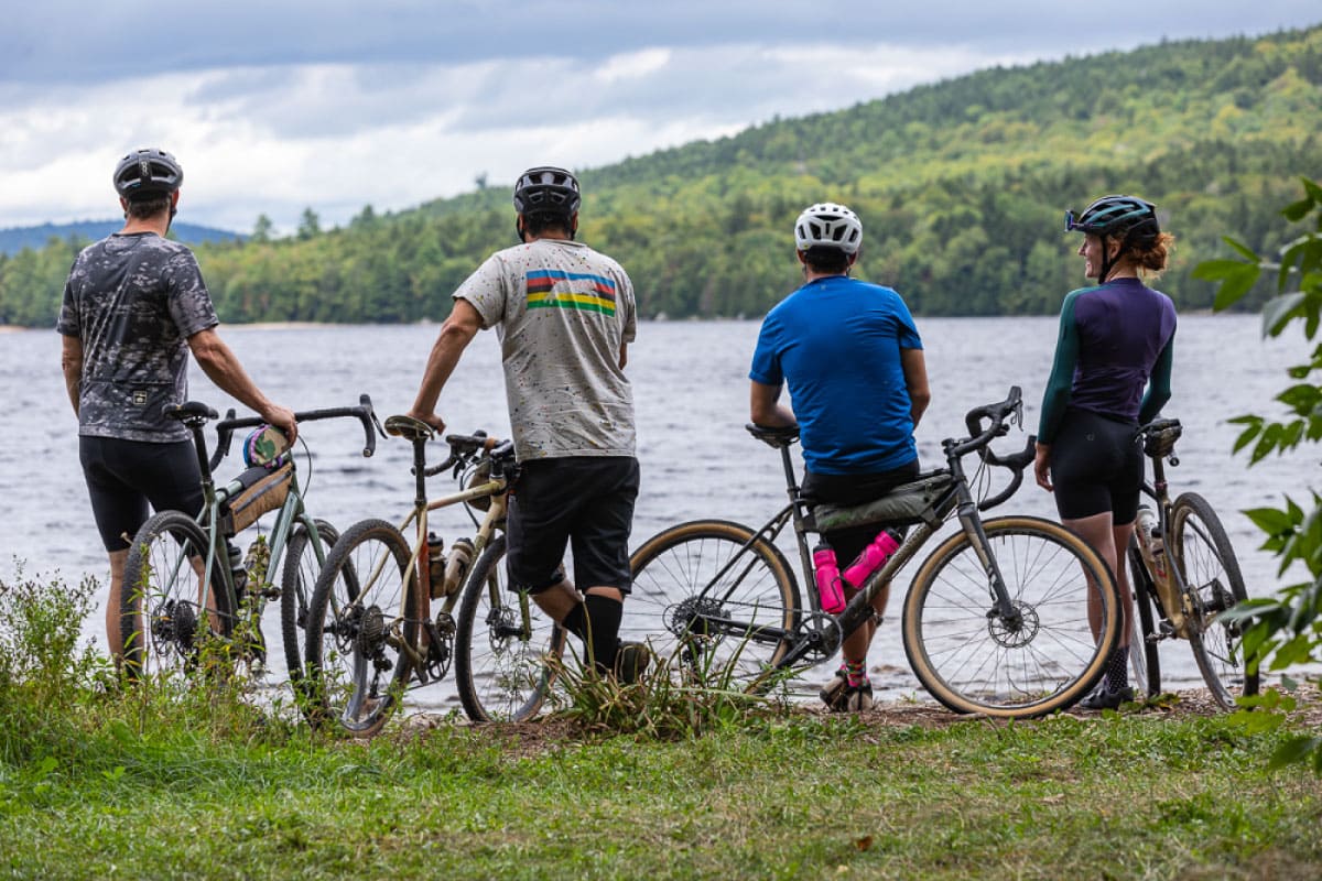 Cyclists viewing a remote lake