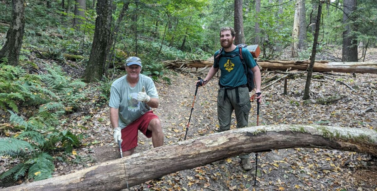 AMC members clearing blowdowns from the NET