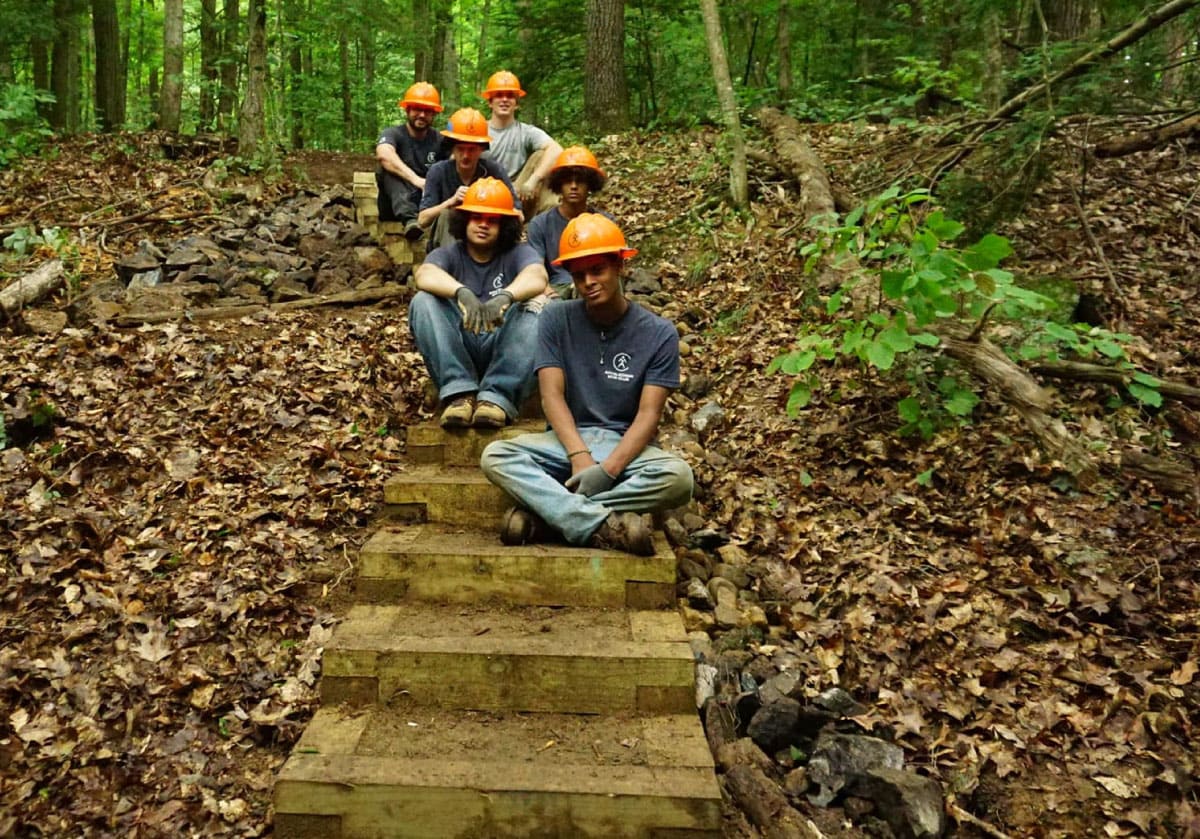 Teen crew on stairs they built