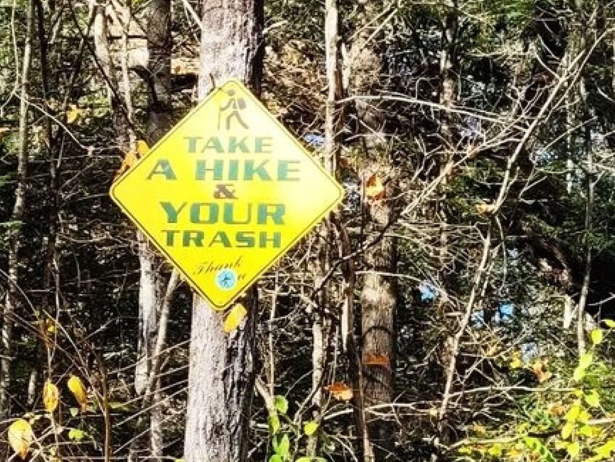 Take a hike and your trash sign