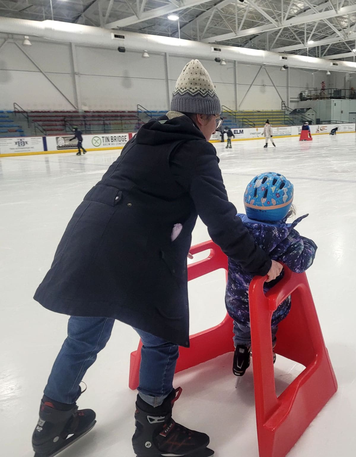 Child and woman skating