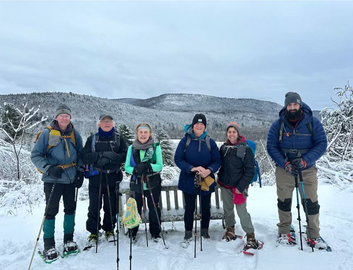 Snowshoers pause for a photo