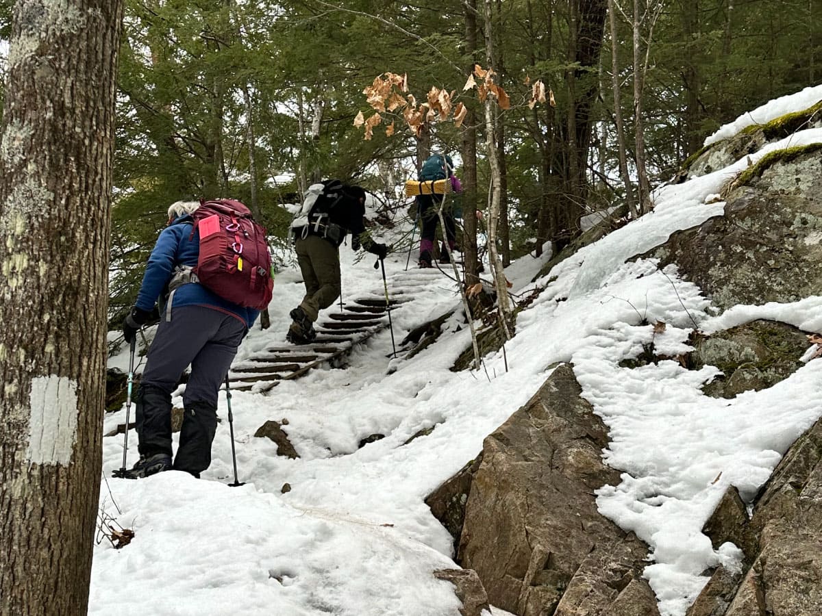 Hikers climbing in winter