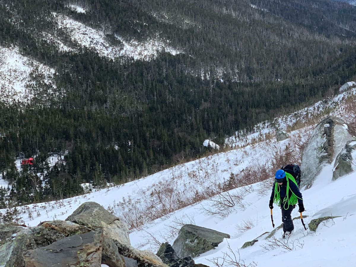 A climber makes a hard approach up the southern side of Huntington Ravine