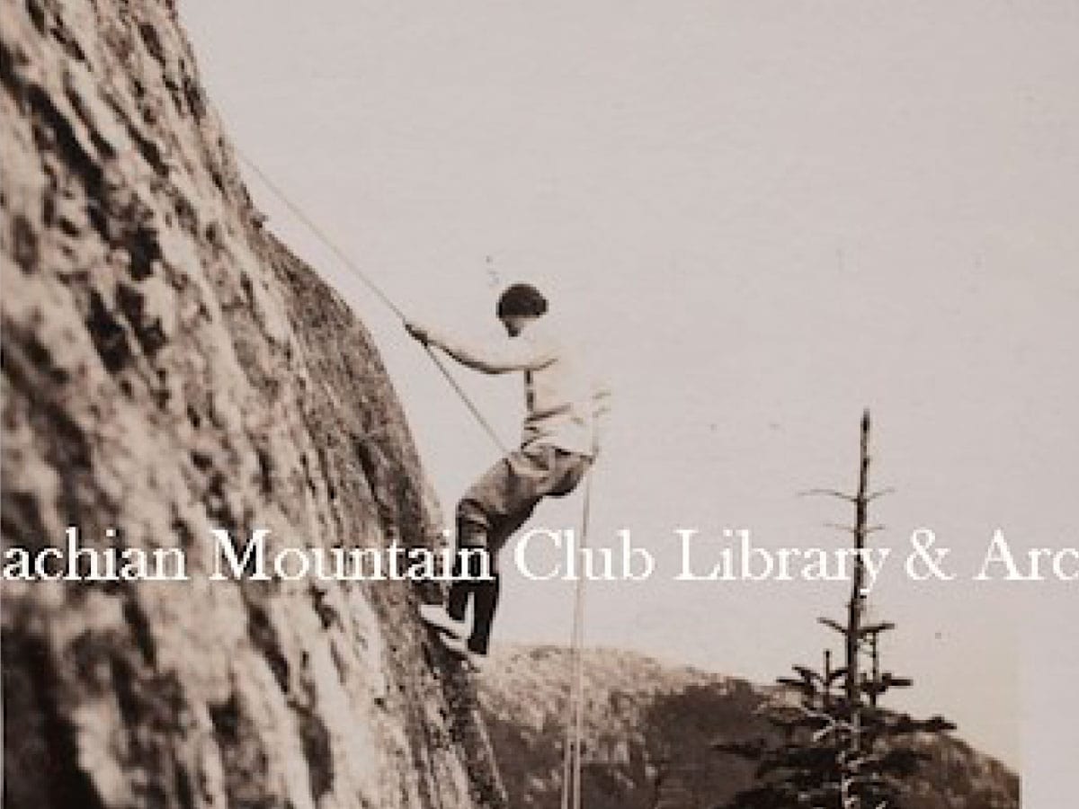 Esther Goodale rappelling down a cliff