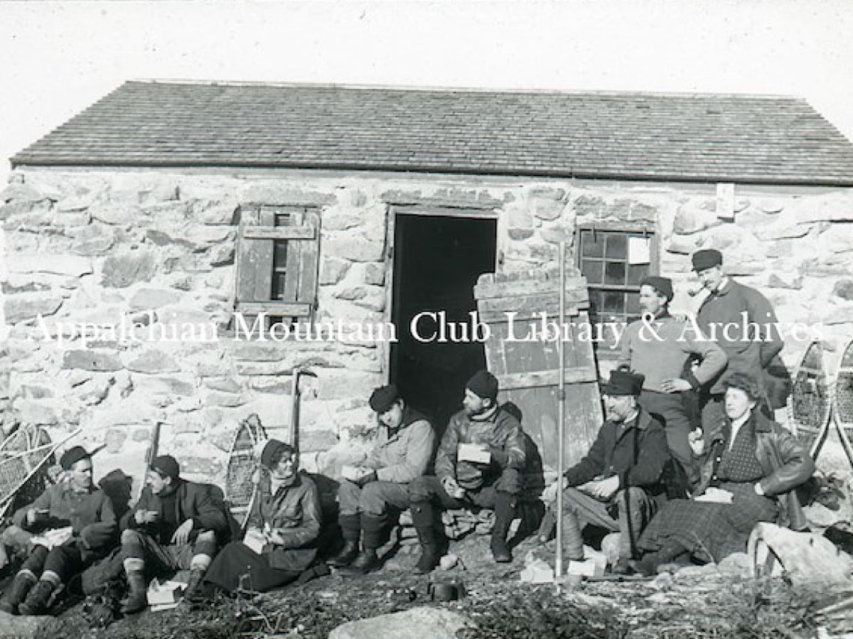 Nine snowshoers at Madison Spring Hut